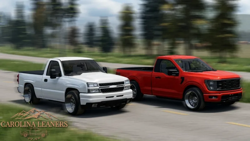 Red single-cab street truck with a black hood sitting low at a rural meet spot